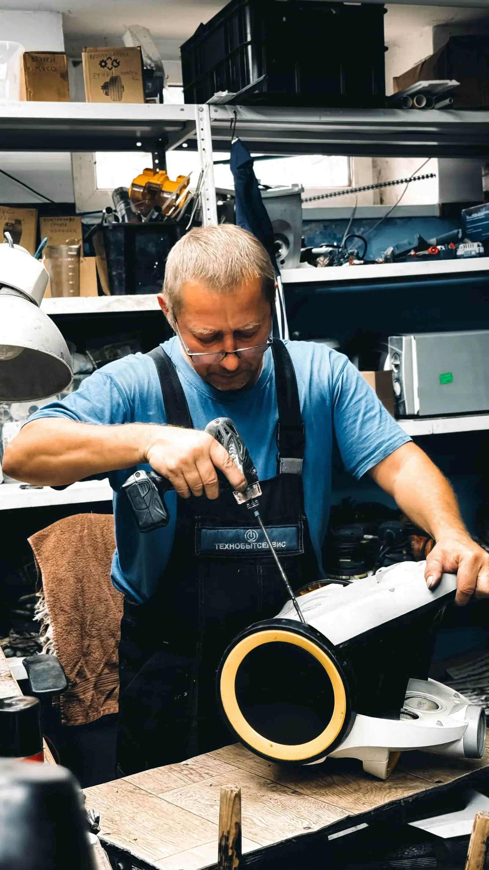 Technician working on a garage door opener